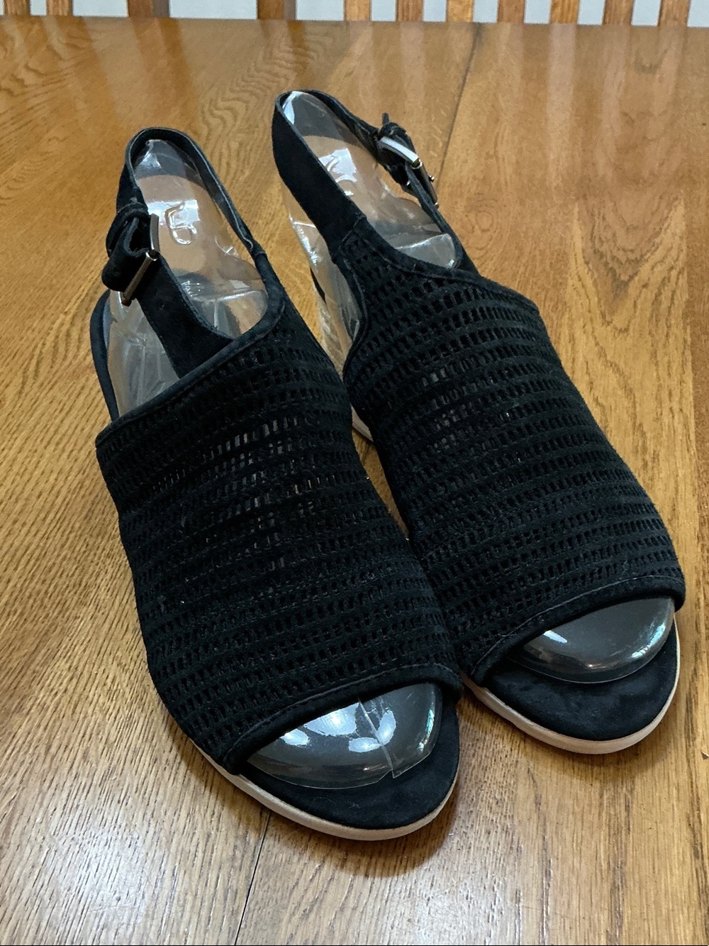 Woman’s Eileen Fisher black cutout leather espadrille. Size 9.5. Heel is 2.25.